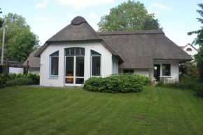 Ferienhaus in Stollhamm mit Großem Garten